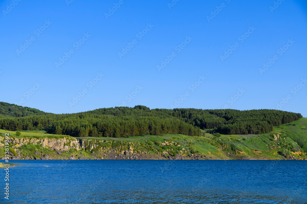 Beautiful lake in the mountains and forest. Beautiful lake in the mountains and forest.