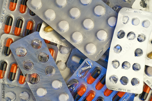 Medicine, pills and tablets with blister packs turning.