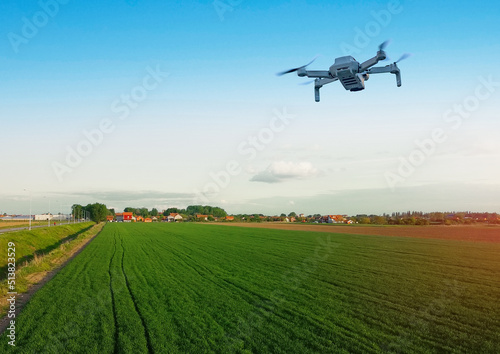 Aerial photography of young wheat field and arable crop land