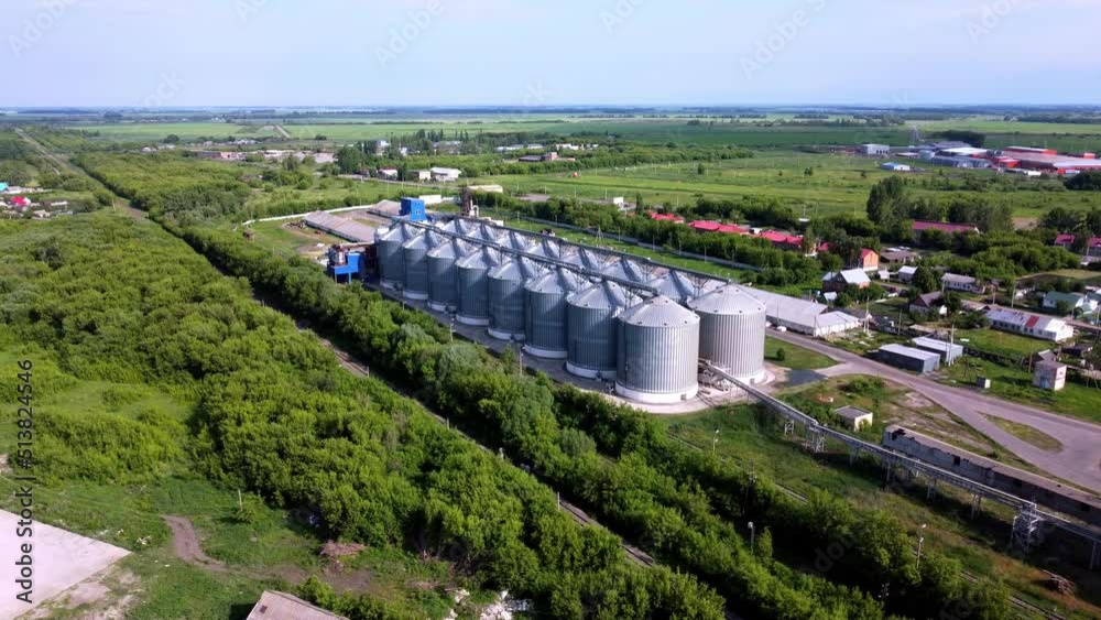 Modern grain silo elevator, view from a height and from different ...