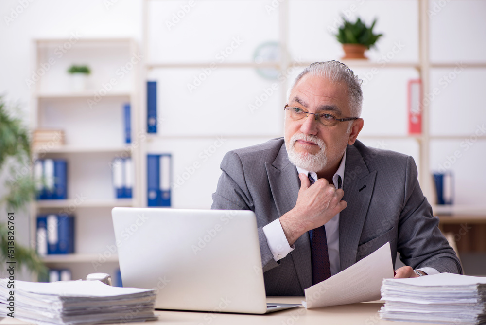 Old male employee and too much work in the office