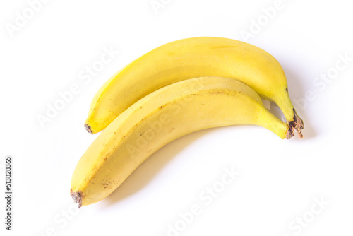 two bananas lie on a white background