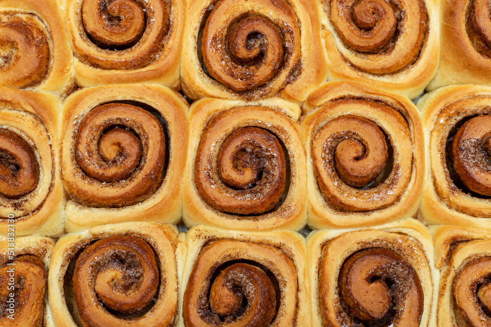 Homemade sweet cinnamon rolls. Freshly cooked buns. View from above