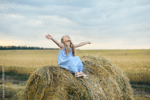 Girl in a wheat field on a barley