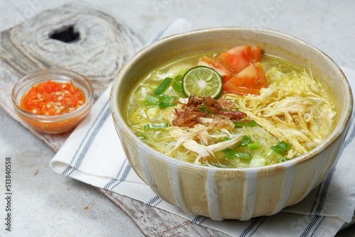 Soto ayam is a typical indonesian food in the form of a kind of chicken soup with a yellowish sauce 