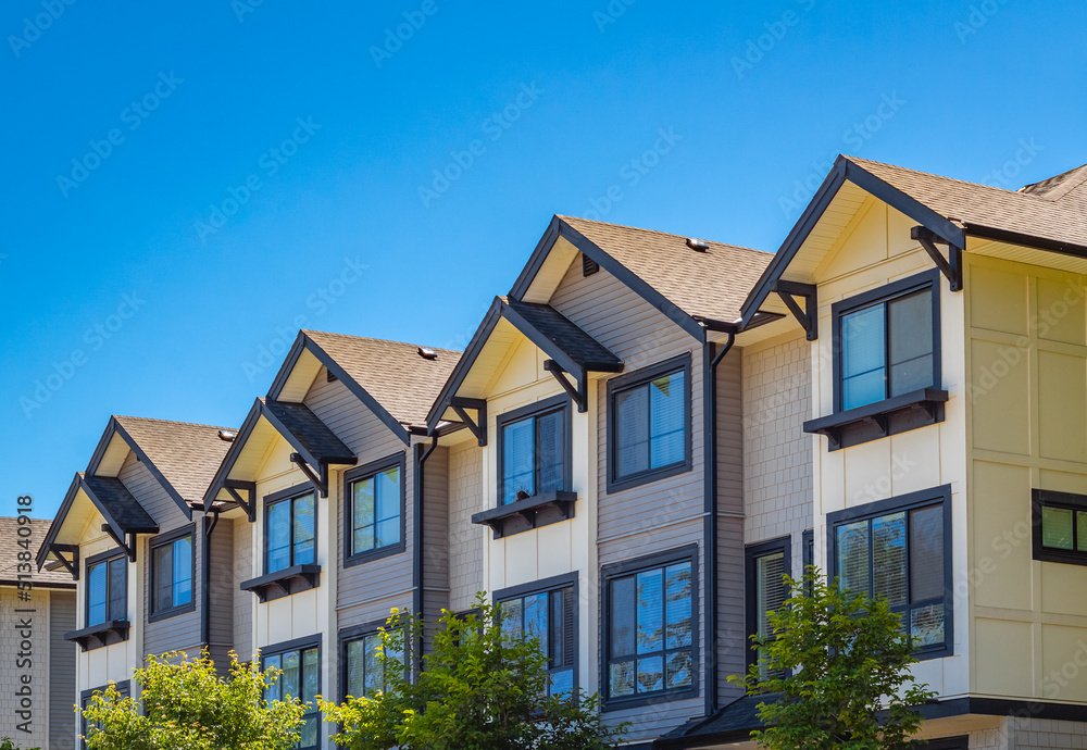 New Modern Apartment Buildings in Vancouver BC. Architectural details of modern apartment building in sunny day New Modern Apartment Buildings in Vancouver BC. Architectural details of modern apartment building in sunny day