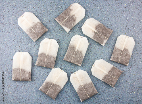 Tea bags on a blue background.Tea in disposable tea bags. Tea is on the table.