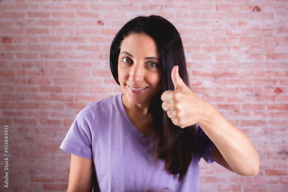 woman with many expression and gestures thumb's up 