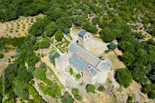 Drone view of medieval Serrabone Priory, former monastery of Canons Regular in valley of Boules at centre of Aspres mountain range, France.. photo