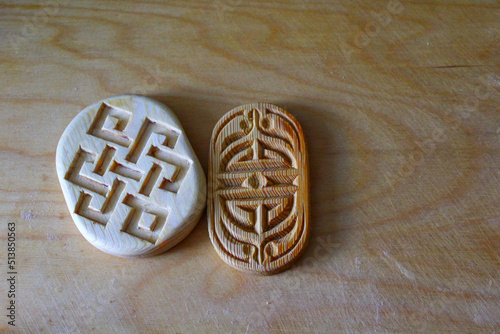 Canvas Print Wooden block with ornate traditional carvings for baking boov biscuits