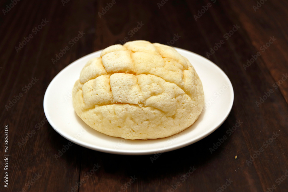 Melon bread, a sweet dessert bread that is a staple of Japan on the table Melon bread, a sweet dessert bread that is a staple of Japan on the table