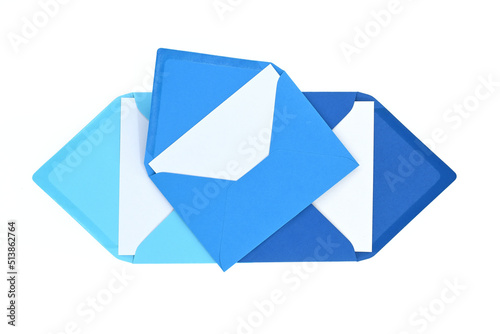 Envelopes of blue hues with blank white card