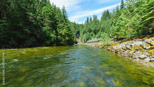 Photos Mossy boulders by Capilano River, just below Cleveland Dam and Capilano fish hatchery, North Vancouver, BC, early summer