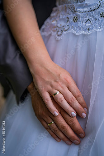 Fotobehang bride and groom hands
