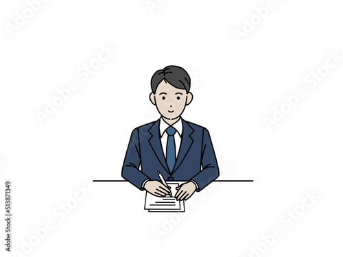 書類を作成する　スーツ姿の男性　会社員　ビジネスマン　仕事