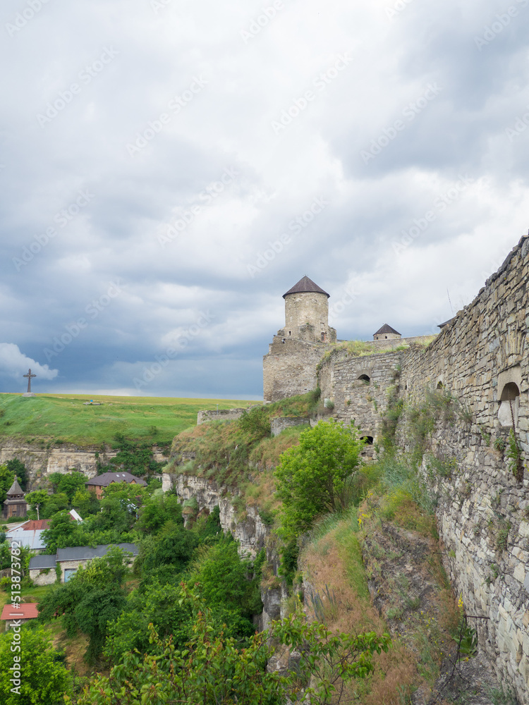 Kamianets Podilskyi fortress on cloudy day in Khmelnytskyi Region, Ukraine. Popes Tower, also known as Karmeliuks Tower, Julian Tower, was built sometime in the 15th and 16th centuries
