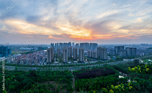 Aerial view of urban buildings residential area scenery in Jiaxing, China, Asia. Beautiful cityscape at dusk.