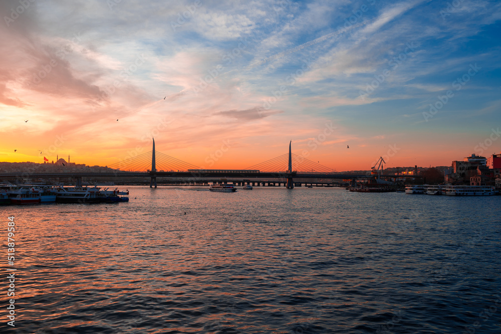 Boats in sea and scenic sunset in Istanbul