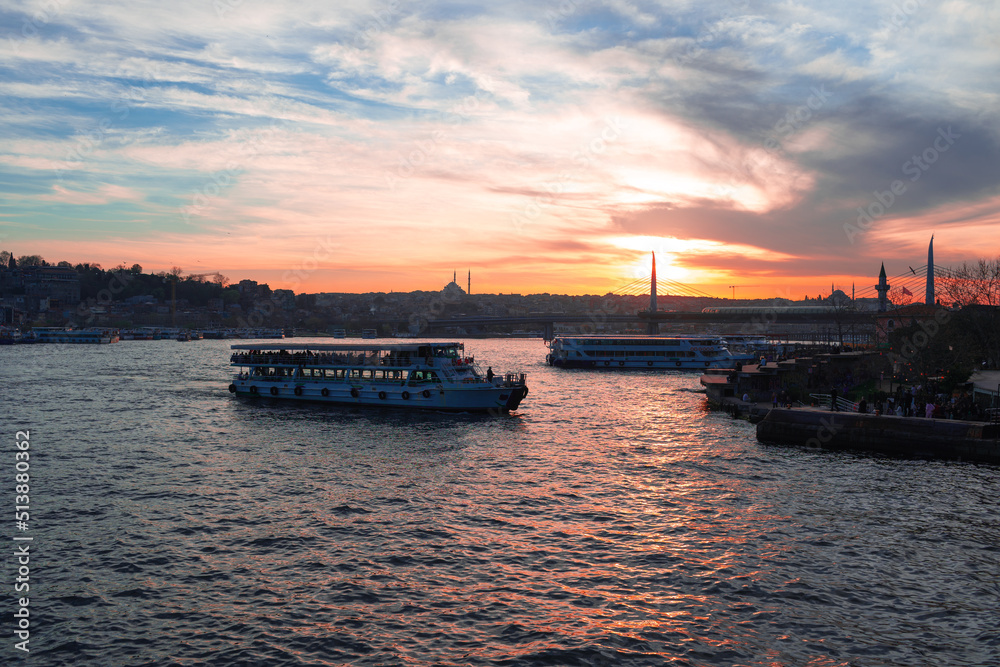 Boats in sea and scenic sunset in Istanbul