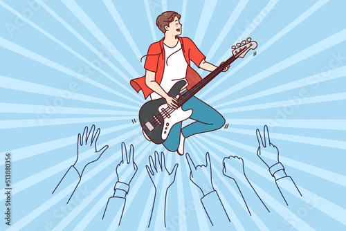 Crowd enjoying concert of male artist. Man performer playing guitar on stage for audience. Flat vector illustration. 