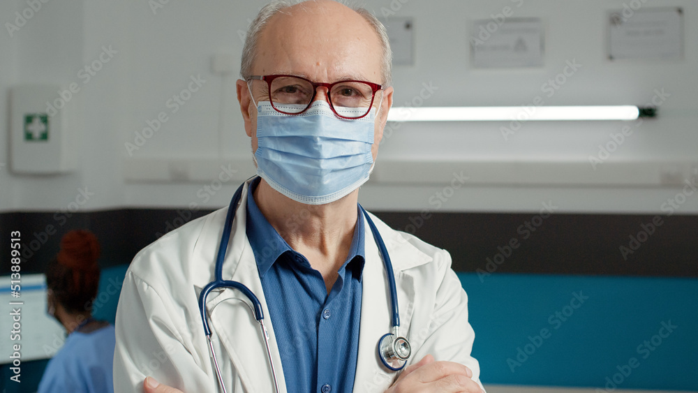 Portrait of male doctor with face mask working in health care system to help patients with disease. Senior man with medical expertise in cabinet, doing consultation appointments. Portrait of male doctor with face mask working in health care system to help patients with disease. Senior man with medical expertise in cabinet, doing consultation appointments.