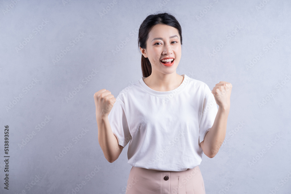 Imagr of young Asian woman posing on background Imagr of young Asian woman posing on background