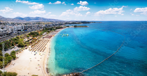 Fototapeta Naklejka Na Ścianę i Meble -  Aerial view of the beautiful Akti Iliou beach at the south coast of Athens, Alimos, Greece, during summertime