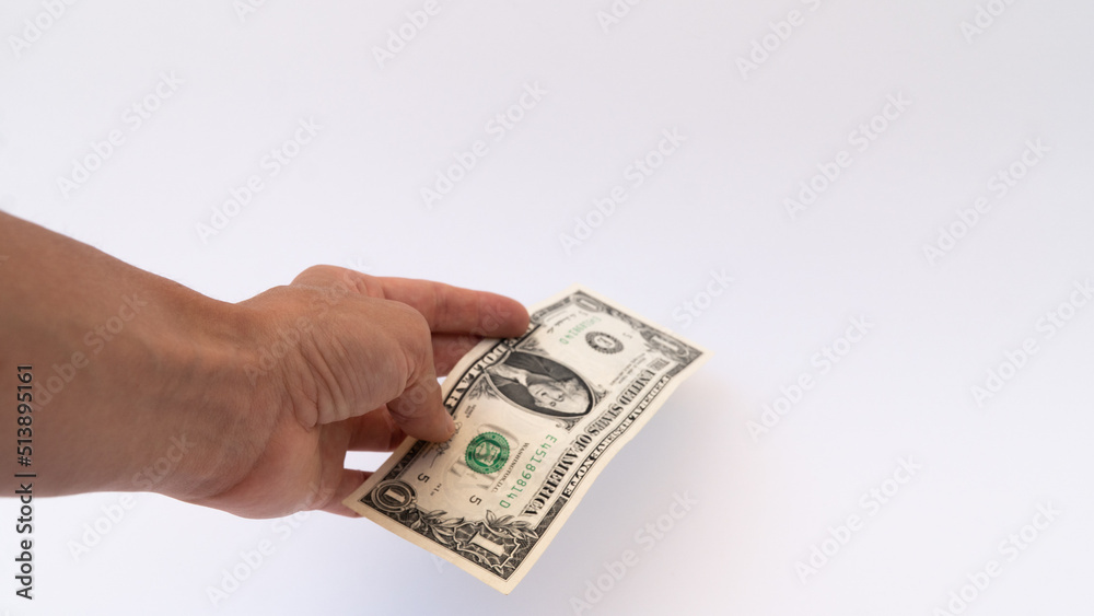 isolated hand with one us dollar isolated hand with one us dollar