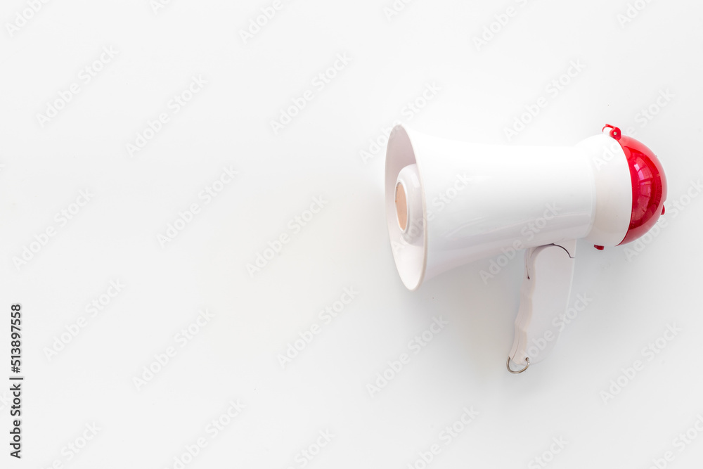 Fototapeta premium White loudspeaker for announcing hiring or advertising. Megaphone device