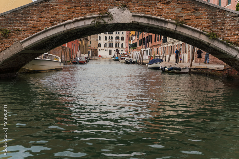 architectural detail of a bridge over a canal in Venice, Italy