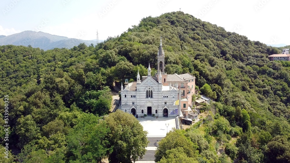Italy, Rapallo, Liguria, Drone aerial view of the Catholic Church sanctuary of Montallegro stands on the top of the  mountain overlooking the sea of the bay of Portofino near Genova and Cinque Terre