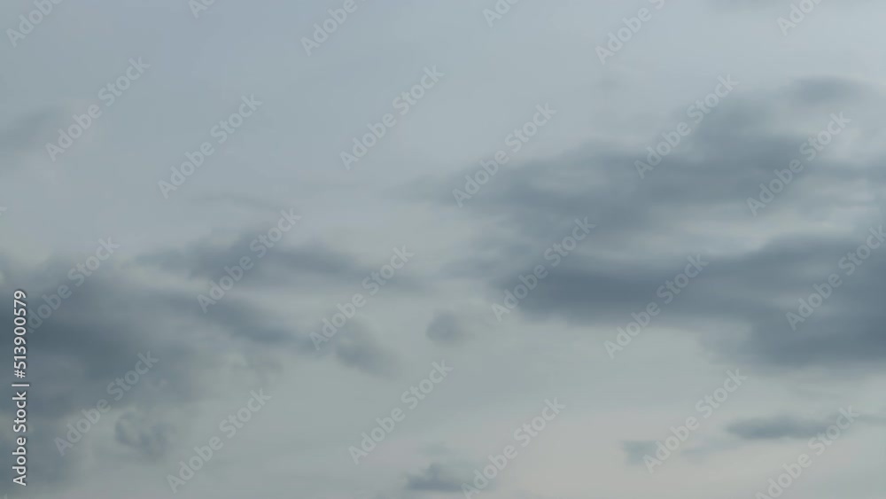 Puffy cumulus clouds swirl at sunset . Time lapse, relaxation dramatic beauty of weather atmosphere relaxation background rolling cumulus clouds Puffy cumulus clouds swirl at sunset . Time lapse, relaxation dramatic beauty of weather atmosphere relaxation background rolling cumulus clouds