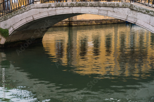 detail of a typical bridge over a canal in Venice, Italy © gammaphotostudio