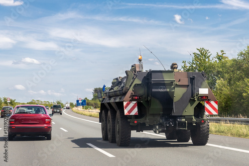 Fotografie German armoured personnel carrier Fuchs drives military convoy highway road