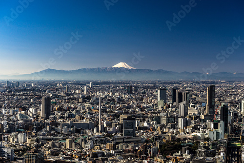 Photography Panorama view of building city with Mount Fuji background.