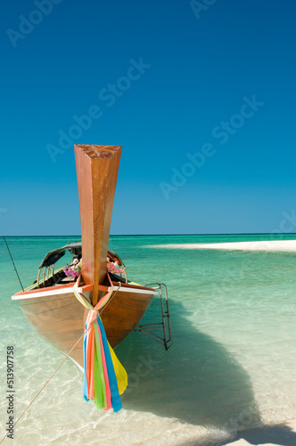 Fototapeta Naklejka Na Ścianę i Meble -  Shot of a boat docked on the shore on a beach in Phuket Thailand