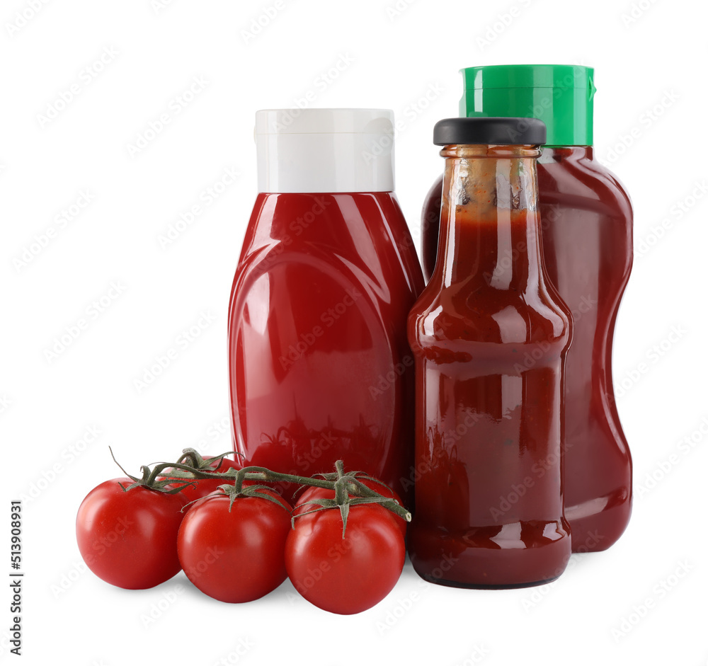 Different bottles of tasty ketchup and fresh tomatoes isolated on white Different bottles of tasty ketchup and fresh tomatoes isolated on white