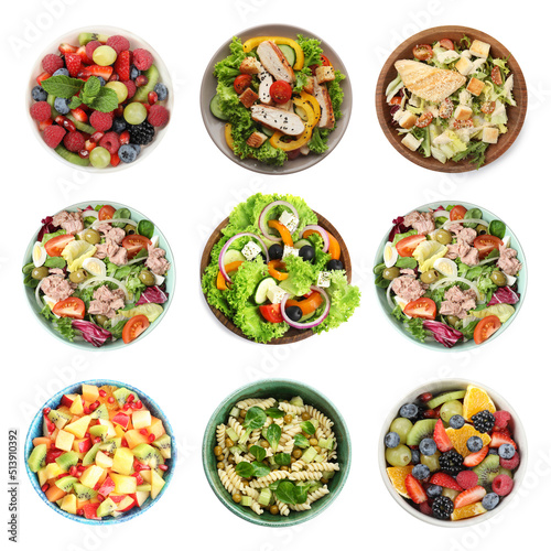 Set with different tasty salads on white background, top view