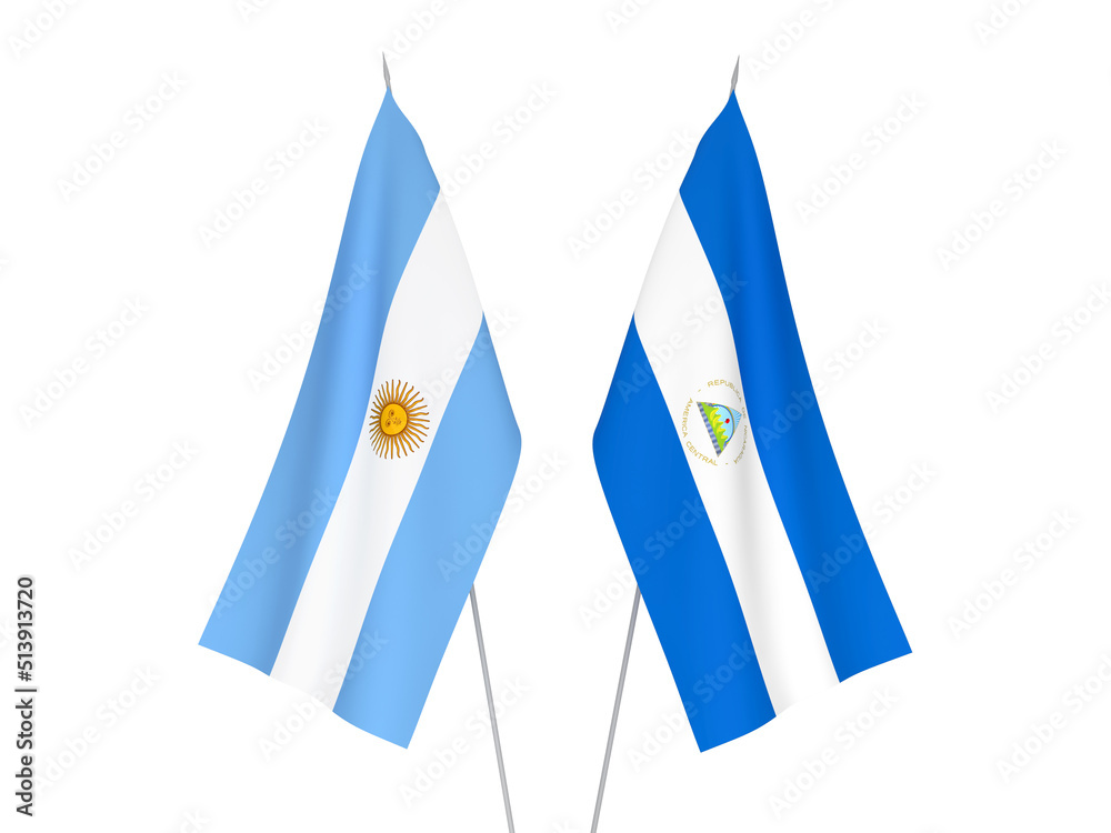 National fabric flags of Argentina and Nicaragua isolated on white background. 3d rendering illustration. National fabric flags of Argentina and Nicaragua isolated on white background. 3d rendering illustration.