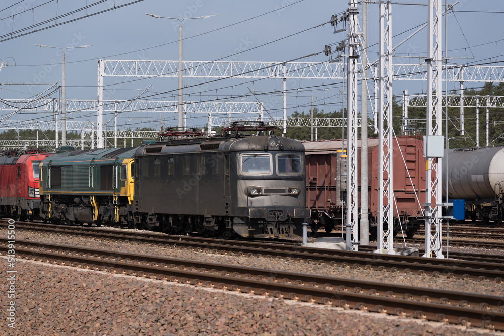LOCOMOTIVES - Electric vehicles on a siding and railway infrastructure
