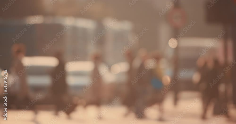 Blurred busy background of a person riding a motorbike through a crowd of people in the city Blurred busy background of a person riding a motorbike through a crowd of people in the city