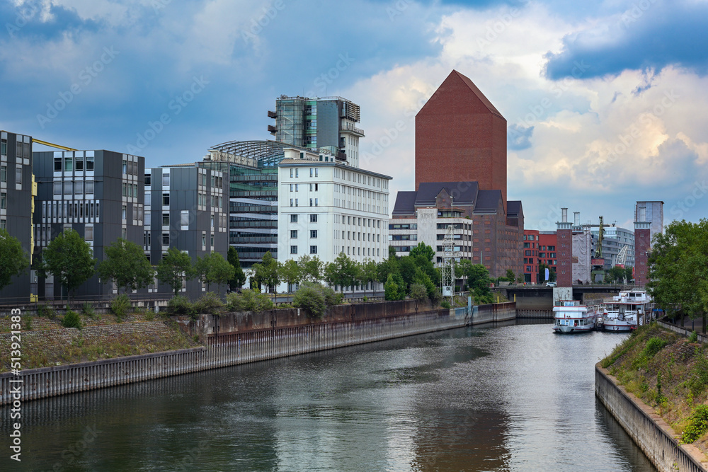 Inner harbor of Duisburg, Germany with the State archive of North Rhine-Westphalia, the monumental tower building of red brick without windows was a former granary, copy space