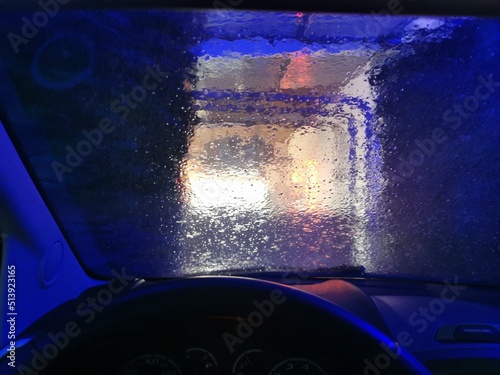 View of an automatic car wash from inside a car
