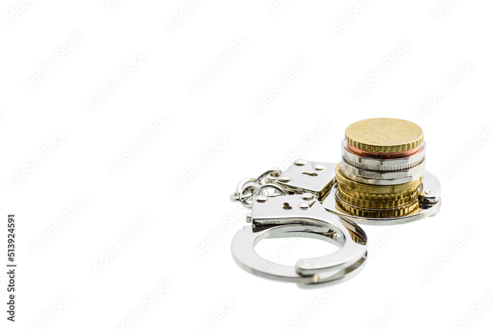 © William W. Potter - Business fraud and tax avoidance / evasion concept : Coin in a silver handcuff, depicts the use of illegal methods to modify financial situation or reports to lower or avoid paying tax. White isolated