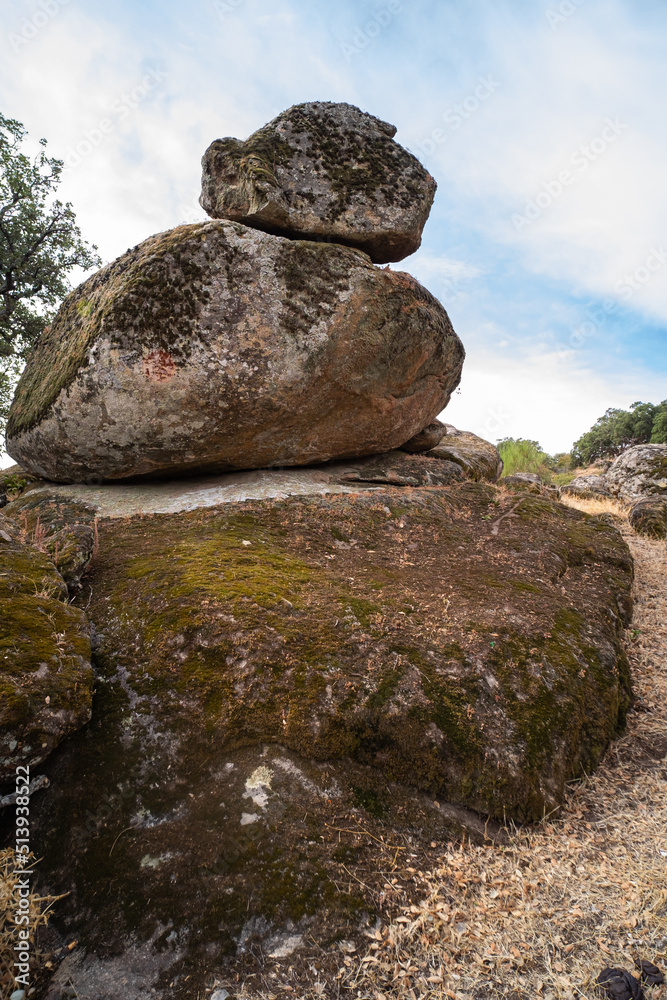 Beautiful landscape of trees growing between the huge granite rocks. Beautiful landscape of trees growing between the huge granite rocks.