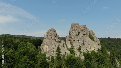 flying over the rocks in the mountains