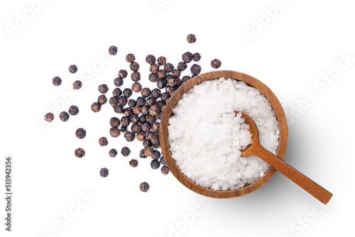Natural sea salt and black pepper (peppercorns) isolated on white background, top view, flat lay.
