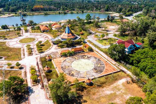 Nong Yai Pond and Wooden Bridge in Chumphon, Thailand photo