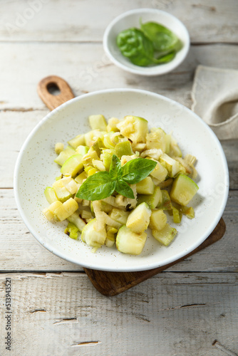 Homemade courgette ragout with fresh basil