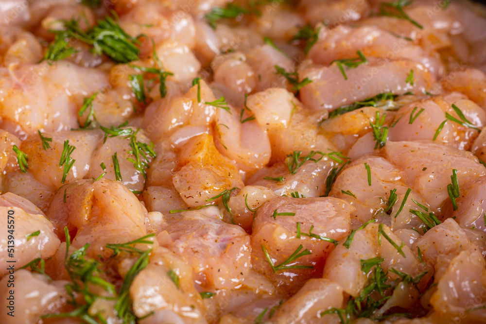 Raw chicken sliced in slices in a marinade Raw chicken sliced in slices in a marinade